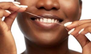 Dental flossing to remove plaque